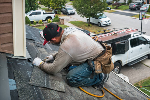 Professional Roofing technician working in De Witt, NY